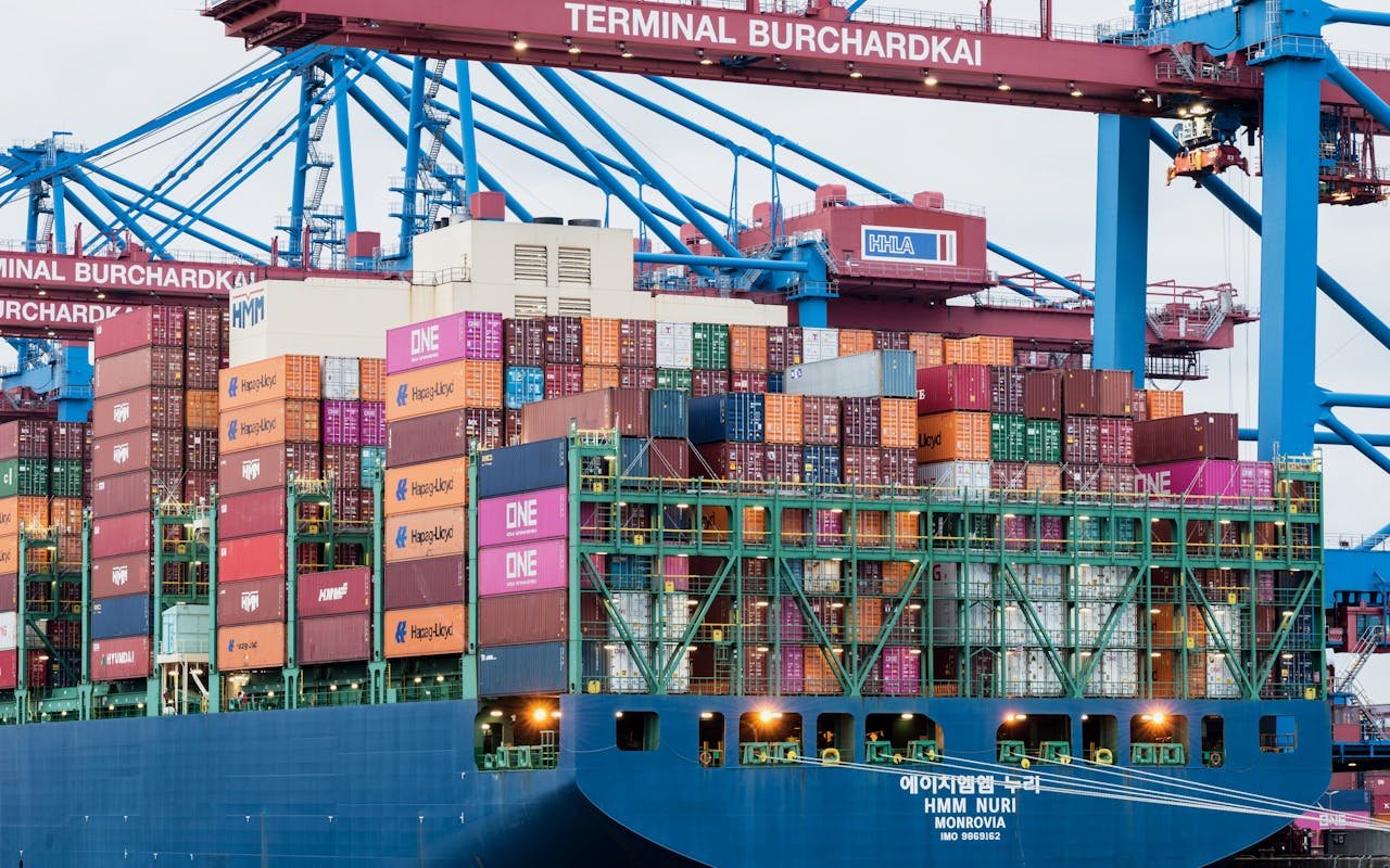 Insights Container ship at Terminal Burchardkai, Hamburg harbor.